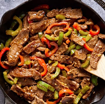 Pepper Steak steak with sliced red and green peppers