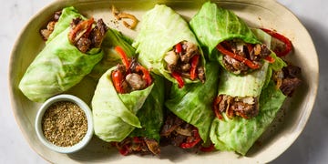 steak, peppers, and onions in a cabbage wrap