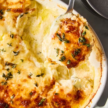Potatoes au gratin potatoes au gratin topped with thyme
