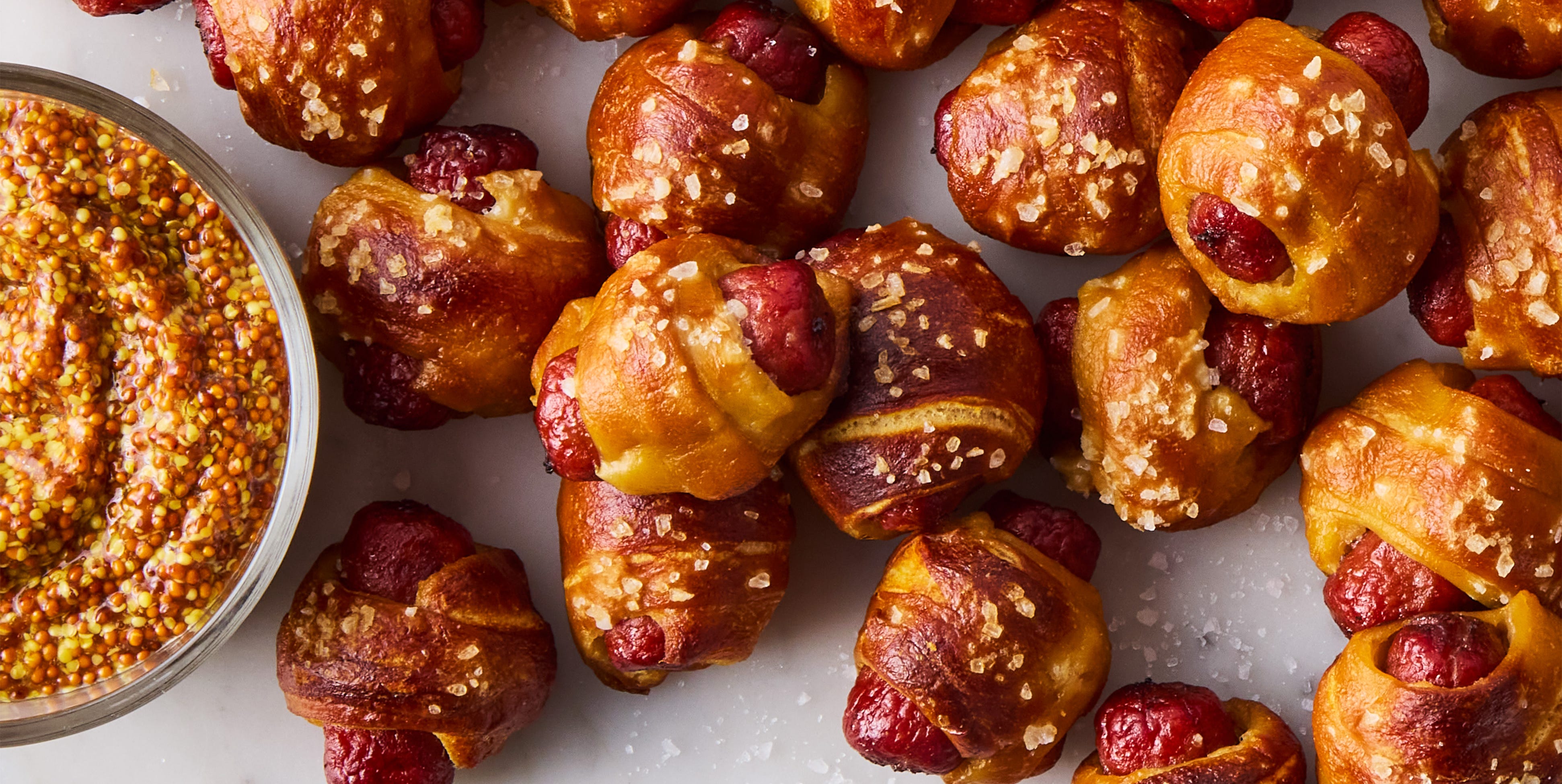 Pretzel Pigs In A Blanket pigs in a blanket made with pretzeled dough