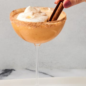 Pumpkin Pie Martini pumpkin pie martini with whipped cream and a cinnamon stick