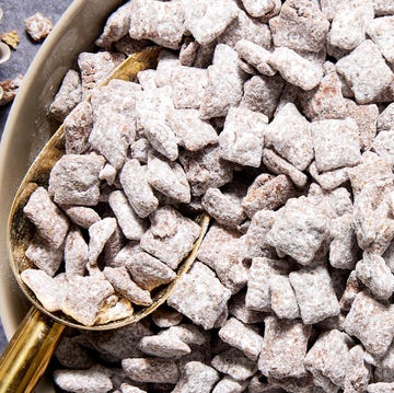Puppy Chow chex mix tossed in peanut butter and powdered sugar
