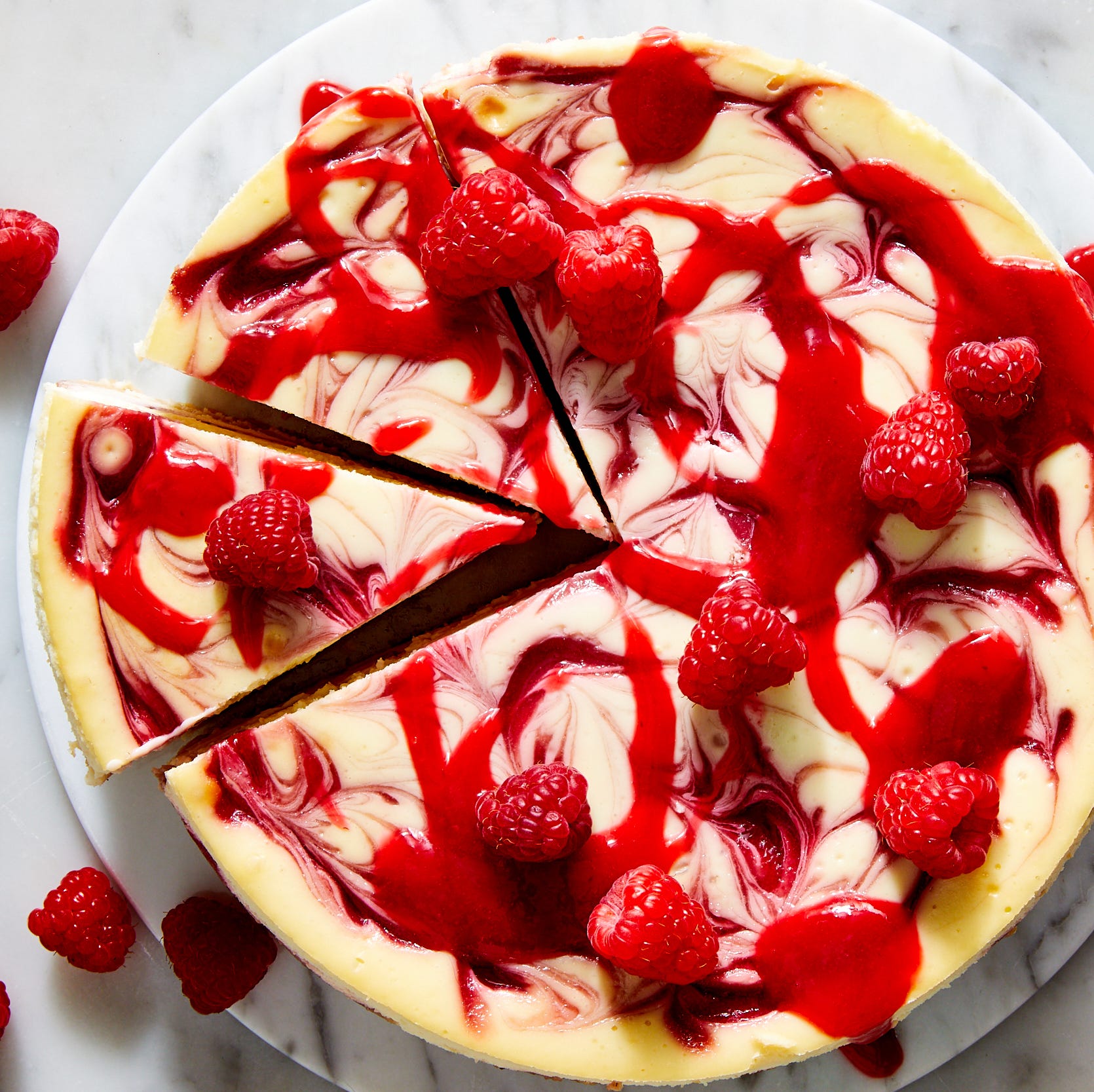 Raspberry Cheesecake raspberry cheesecake with raspberry sauce swirl