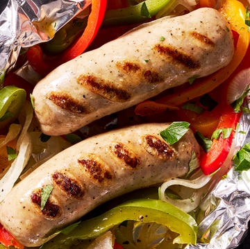 Sausage & Peppers Foil Packs sausage and peppers in a foil pack on the grill