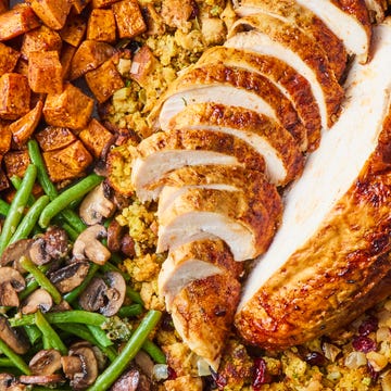 Sheet-Pan Thanksgiving Dinner turkey, stuffing, sweet potatoes, and green beans on a sheet pan