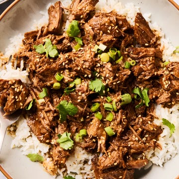 Slow Cooker Korean Beef saucy korean style beef in a slow cooker with green onions