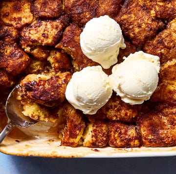 Snickerdoodle Cobbler snickerdoodle mixture baked in a dish and topped with vanilla ice cream
