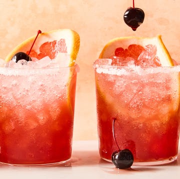 rocks glasses filled with ice, grapefruit juice, sour cherry juice, and tequila, garnished with grapefruit wheels and maraschino cherries rocks glasses filled with ice, grapefruit juice, sour cherry juice, and tequila, garnished with grapefruit wheels and maraschino cherries