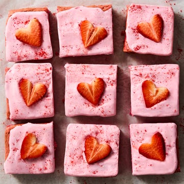 Strawberry Brownies pink brownies topped with pink icing and strawberry hearts
