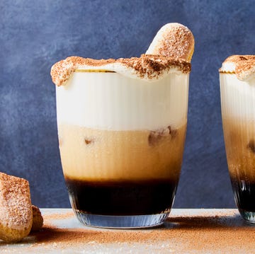 Tiramisu White Russians white russian cocktail topped with whipped cream, cocoa powder, and a lady finger