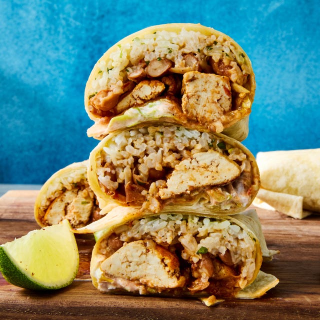 Tofu Burritos tortillas filled with a tofu and rice mixture served with limes