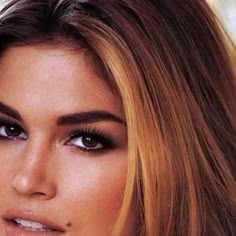 a close up of a person with long hair