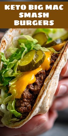 a hand holding a taco with cheese and pickles on it, in front of the caption reads keto big mac smash burgers