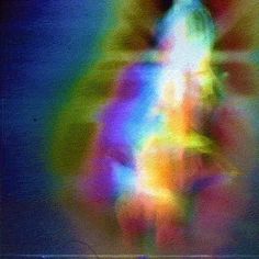 blurry image of a woman walking on the beach