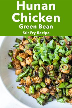 a white plate topped with green bean stir fry