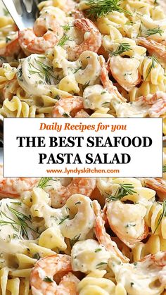 a glass bowl filled with pasta and shrimp