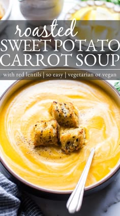 roasted sweet potato carrot soup in a bowl with spoons