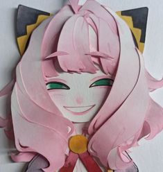a paper cut out of a girl with pink hair