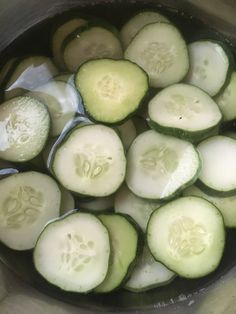 sliced cucumbers are being cooked in a pot