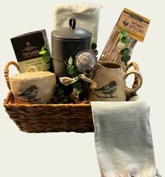 a basket filled with tea and coffee items