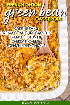 french onion green bean casserole on a white plate with a wooden spoon in it