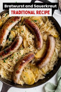 bratwurst and sauerkraut traditional recipe in a skillet with lemons on the side