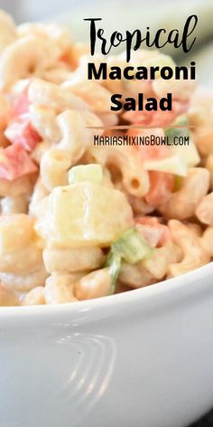 a white bowl filled with macaroni salad