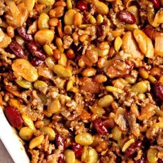a casserole dish filled with nuts and meat