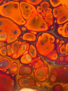 an orange, red and yellow liquid substance