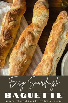 two long loafs of baguette sitting on top of a paper towel