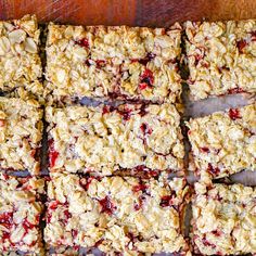 homemade granola bars cut into squares on a cutting board