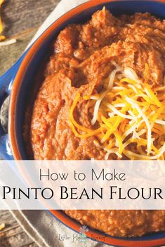 a bowl of pinto beans with cheese on top and the words how to make pinto bean flour