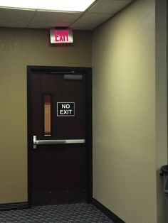 an exit door with a sign that says no exit on the front and back doors