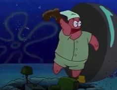 an animated character is standing in front of a large object with one hand on his hip