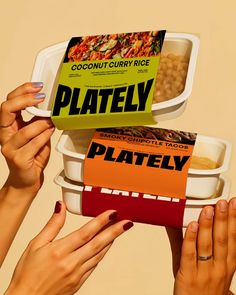 two hands reaching for a plastic container with food in it that says plately on the lid