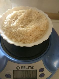 an uncooked pie sitting on top of a digital kitchen scale with the time displayed
