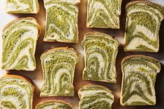 several slices of green and white swirled bread