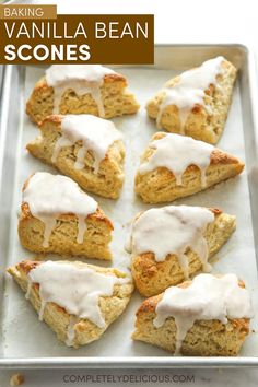 scones with white icing on a baking sheet