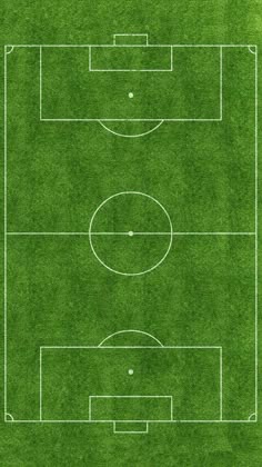 an aerial view of a soccer field in the middle of green grass with white lines on it