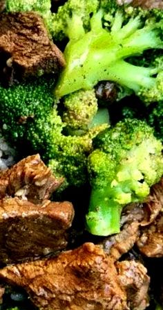 broccoli and beef are mixed together in a bowl