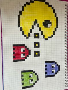 a notebook with some pixel art on it