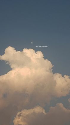 an airplane is flying in the sky with some clouds behind it and a quote above