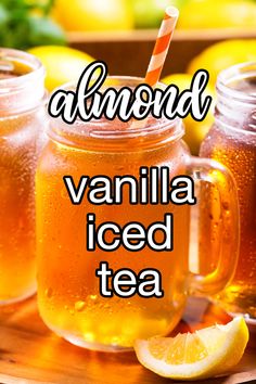 three mason jars filled with iced tea and lemons