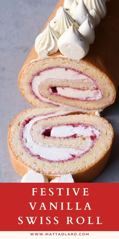 a close up of a roll with cream cheese on top and the words festive vanilla swiss roll