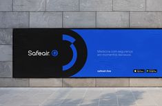 a large blue sign on the side of a building