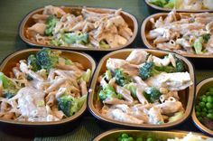 several bowls filled with different types of food
