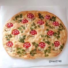 a pizza with mushrooms and parsley on it