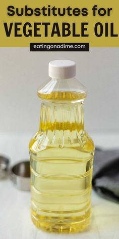 a bottle of vegetable oil sitting on top of a table