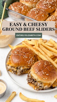 two cheeseburgers and french fries on a white plate with text overlay that reads easy & cheesy ground beef sliders