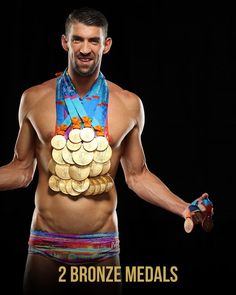 a man with medals around his neck and chest, holding two hands out in front of him
